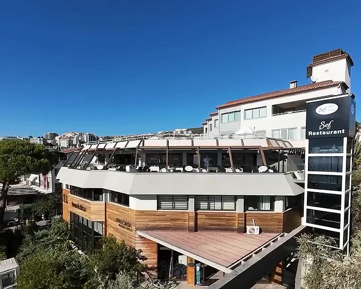 Video: the exterior of the building with the Şef Restaurant sign and the pergola terrace on the top floor
